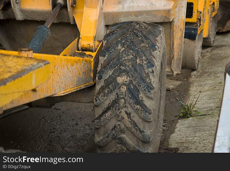 The small bucket of a digger excavation. The small bucket of a digger excavation