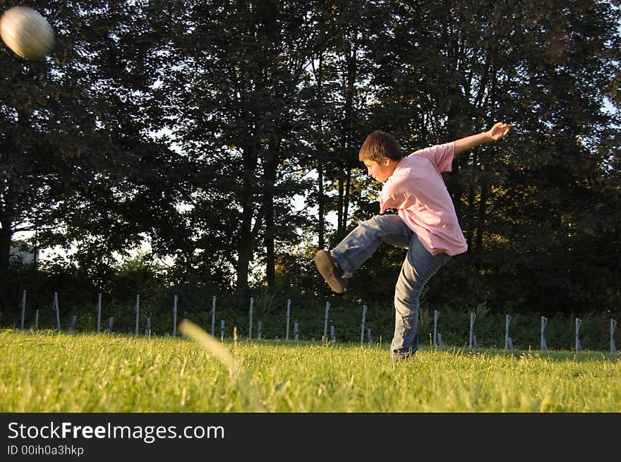 Bou shoots soccerball far far away. Bou shoots soccerball far far away