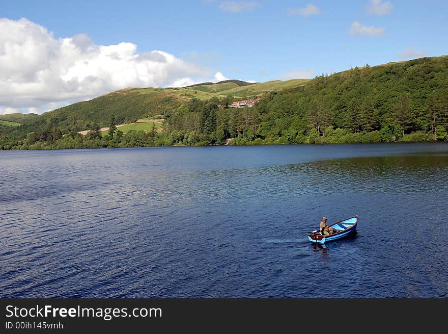 A fishing boat on Lake Vyrnwy/Llyn Efyrnwy in Wales.