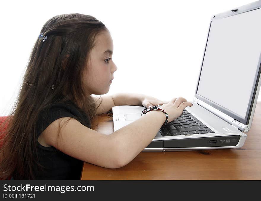 Young girl working on laptop