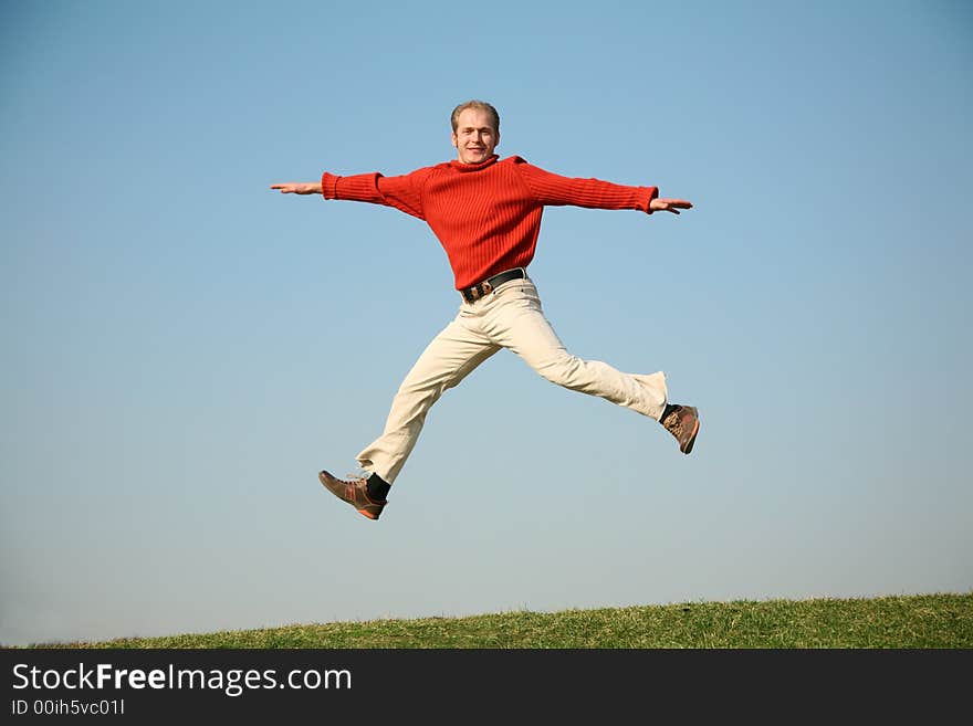 Man jumps against the sky