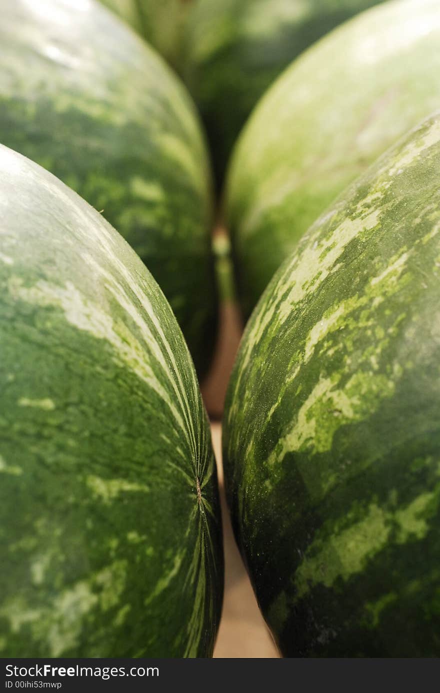 Two watermelons in an outdoor food market