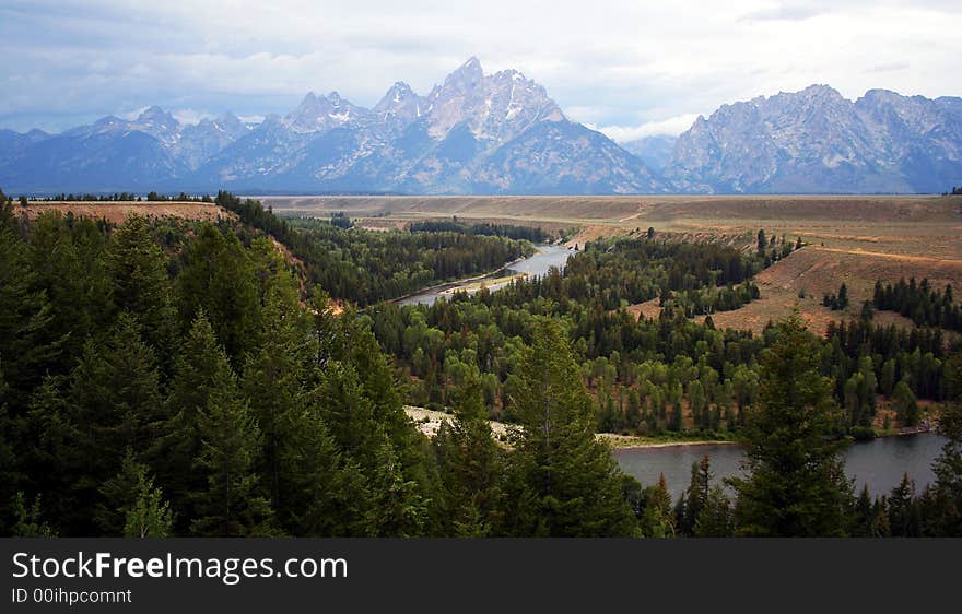 The Grand Teton and Snake River, Wyoming, on a rainy summer evening.