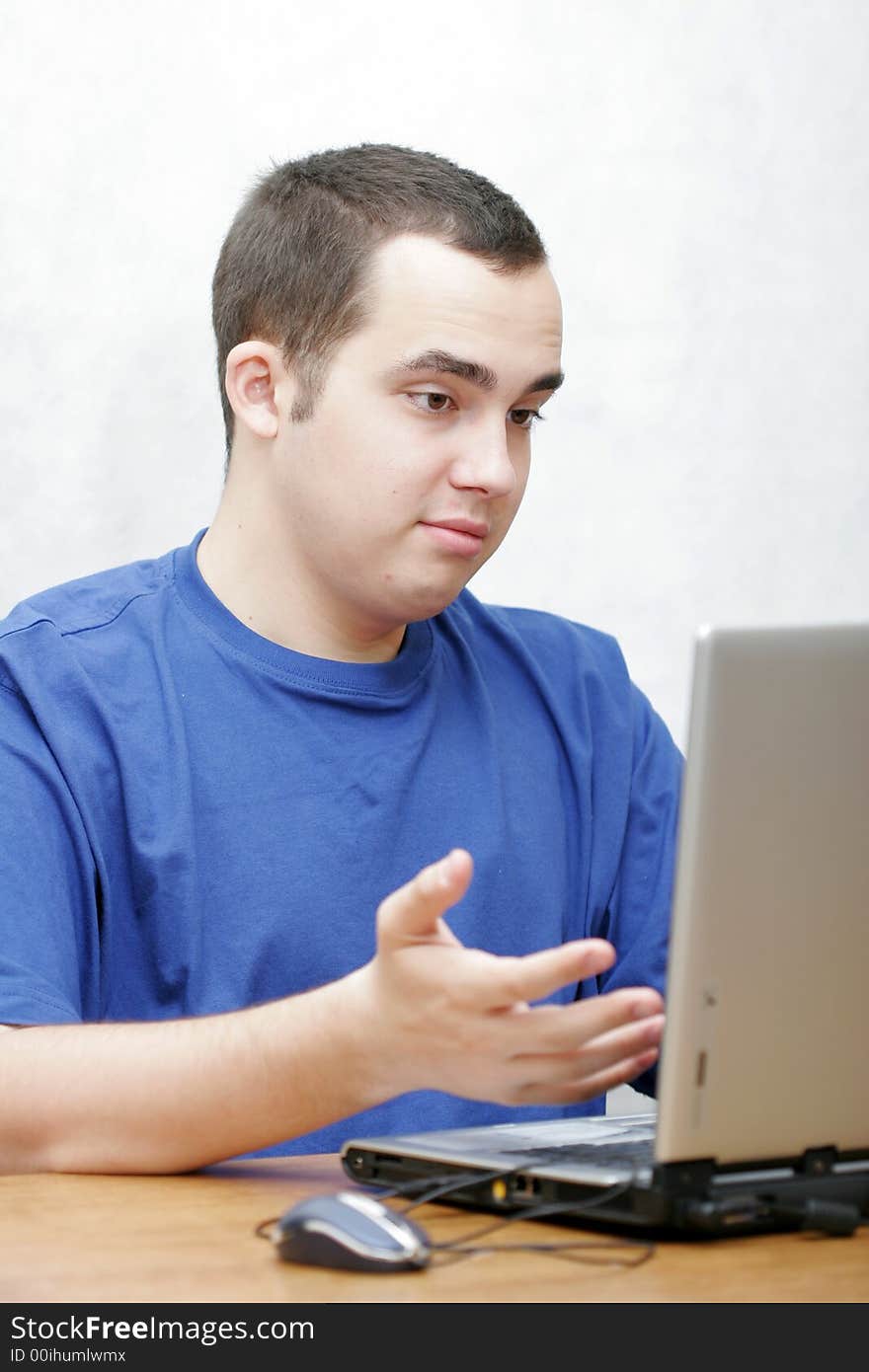 Student working on his laptop