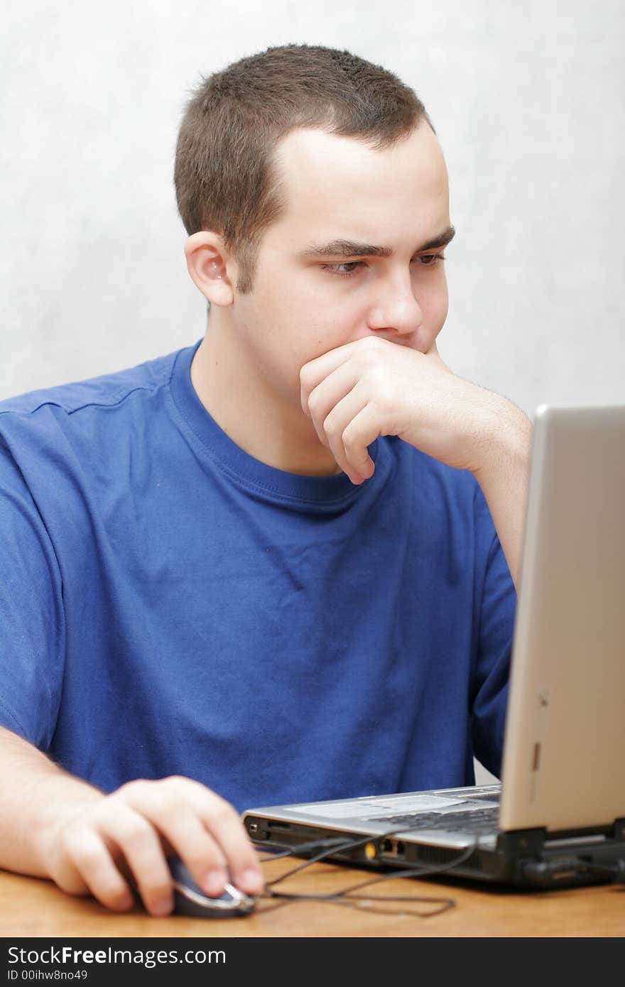 Student Working On His Laptop