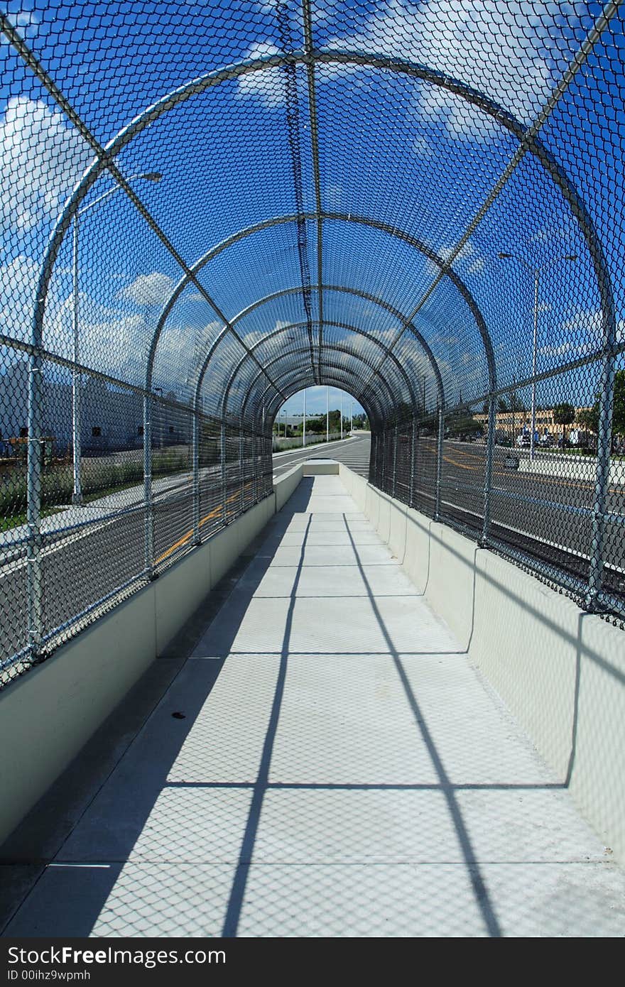 Fenced Walkway on Blue Sky shot in daytime