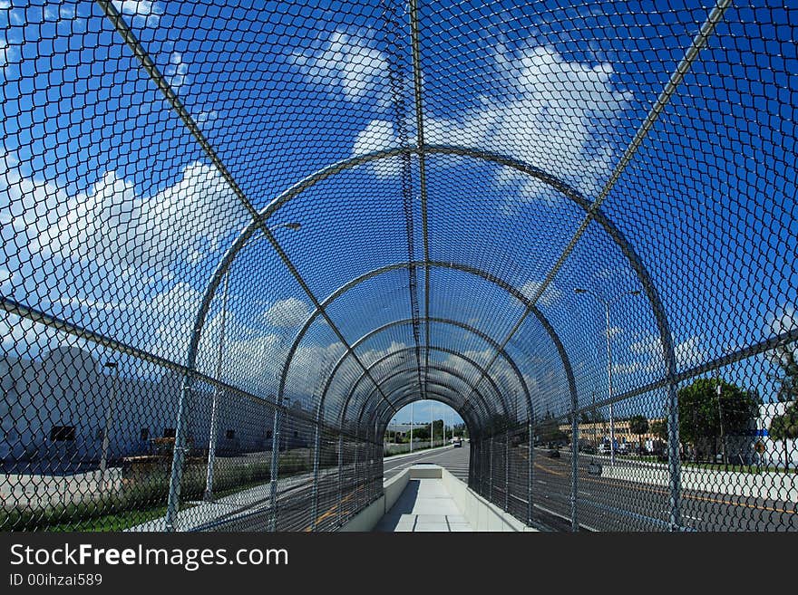 Fenced Walkway on Blue Sky shot in daytime