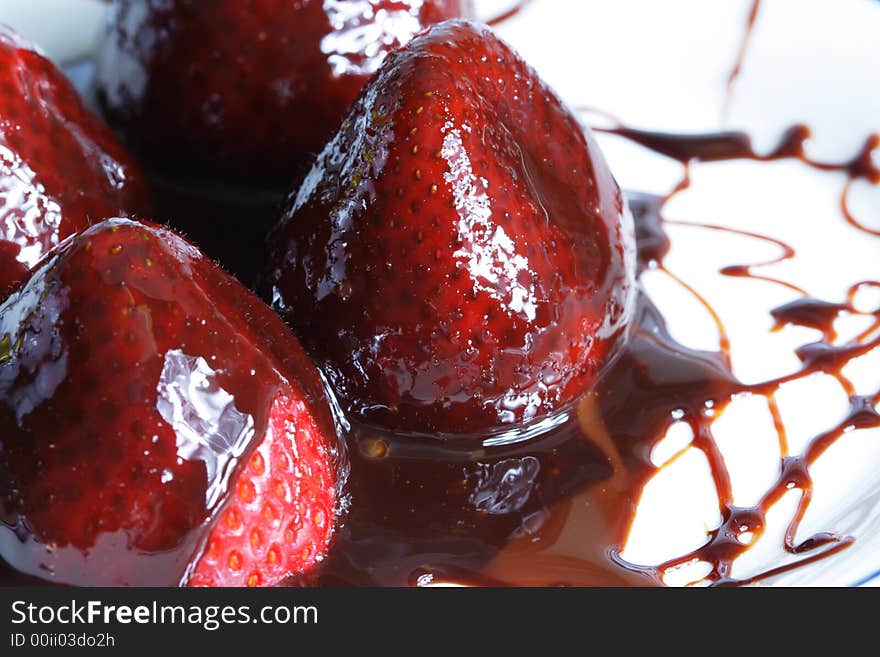 Strawberries on a Plate with chocolate glaze.