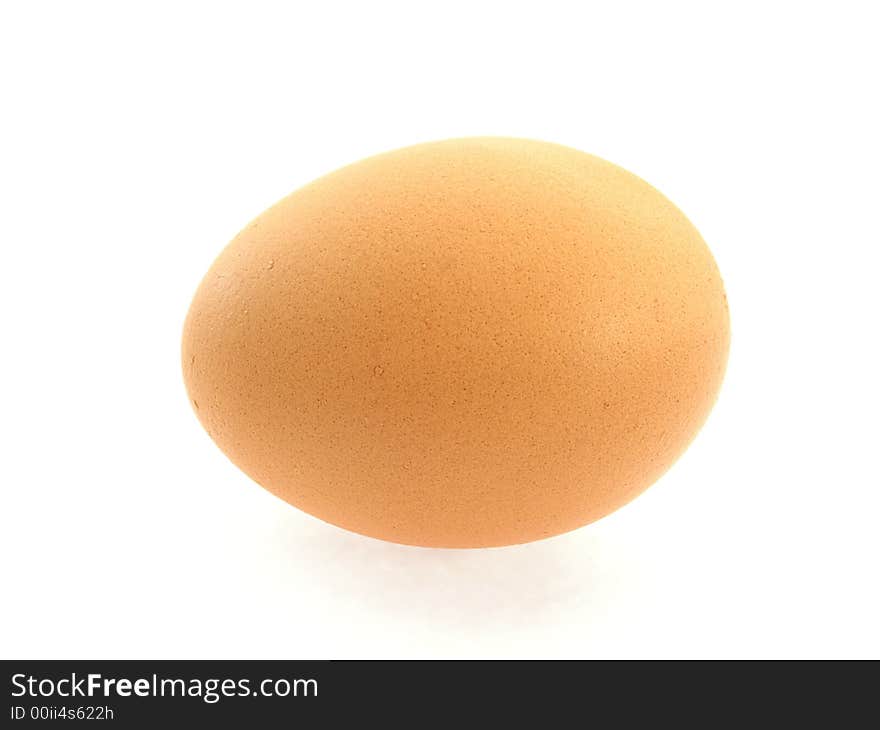 One brown egg isolated on white background