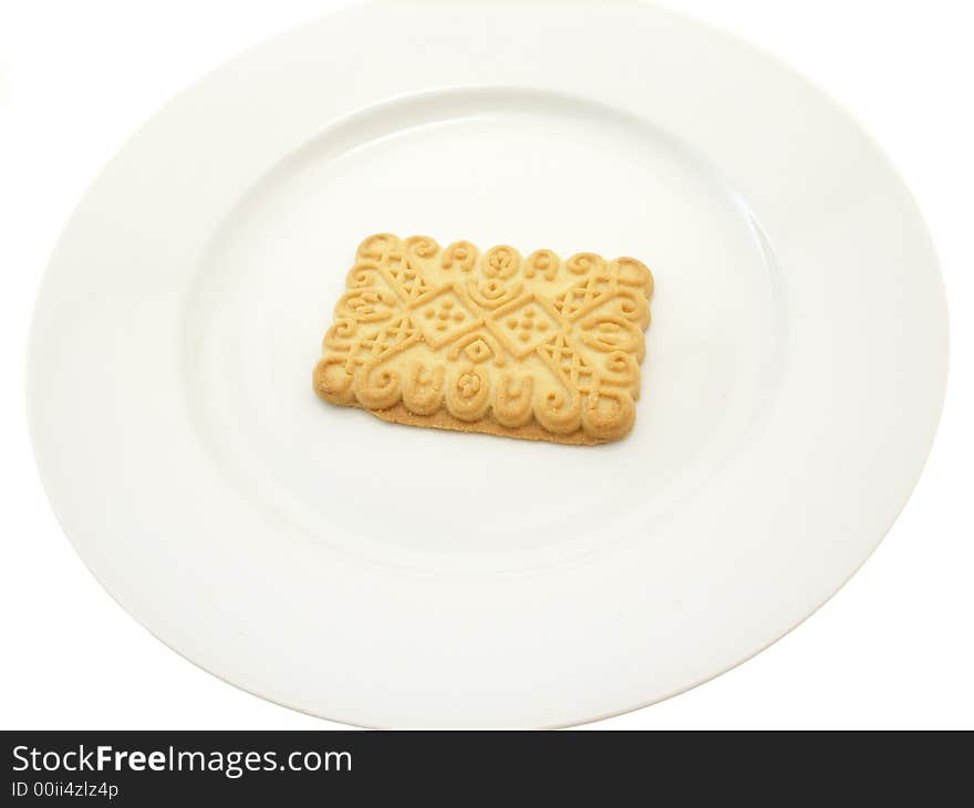 Sweet biscuit on plate isolated on white background