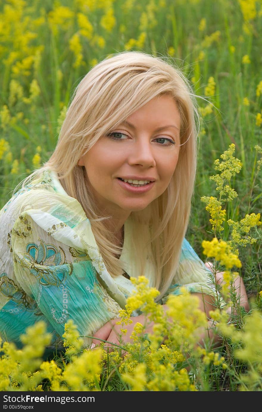 Pretty caucasian girl on the meadow