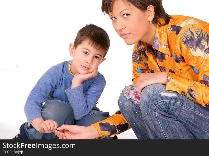 Happy mother and son isolated on white background. Happy mother and son isolated on white background