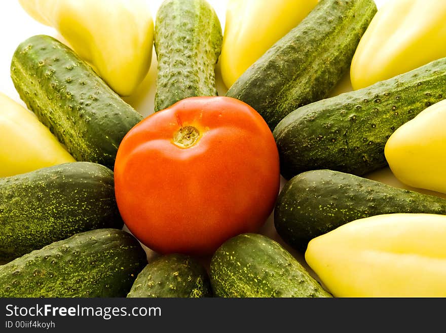 Tomato cucumbers and peppers arranged in star shape. Tomato cucumbers and peppers arranged in star shape