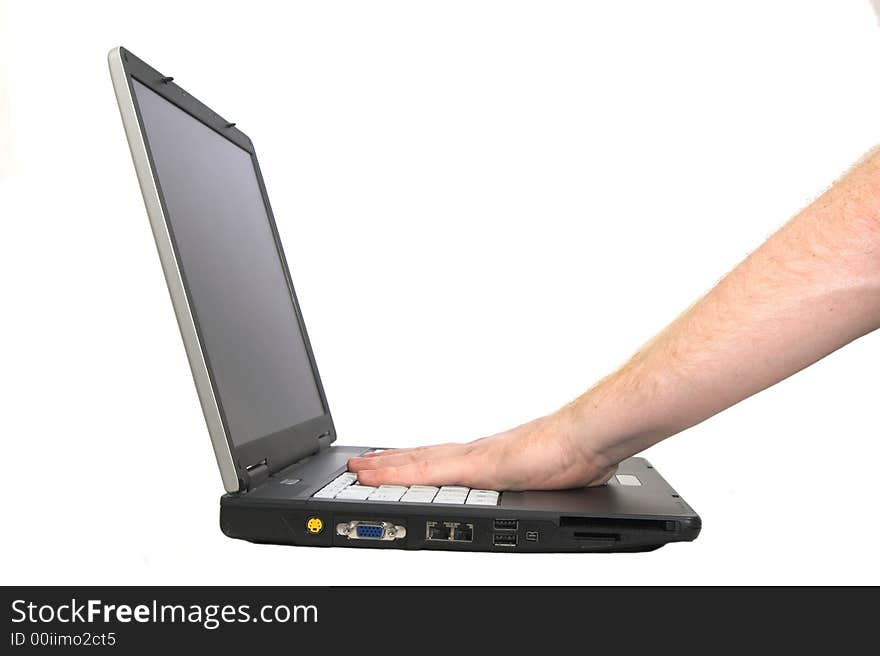 Laptop notebook isolated on white with hand on keyboard