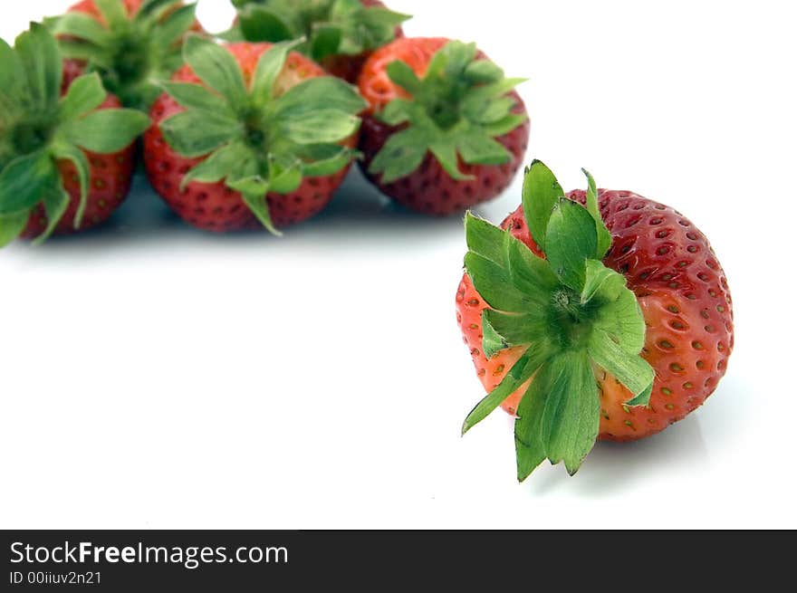 Outstanding Strawberry in front of a bunch of strawberries. Outstanding Strawberry in front of a bunch of strawberries