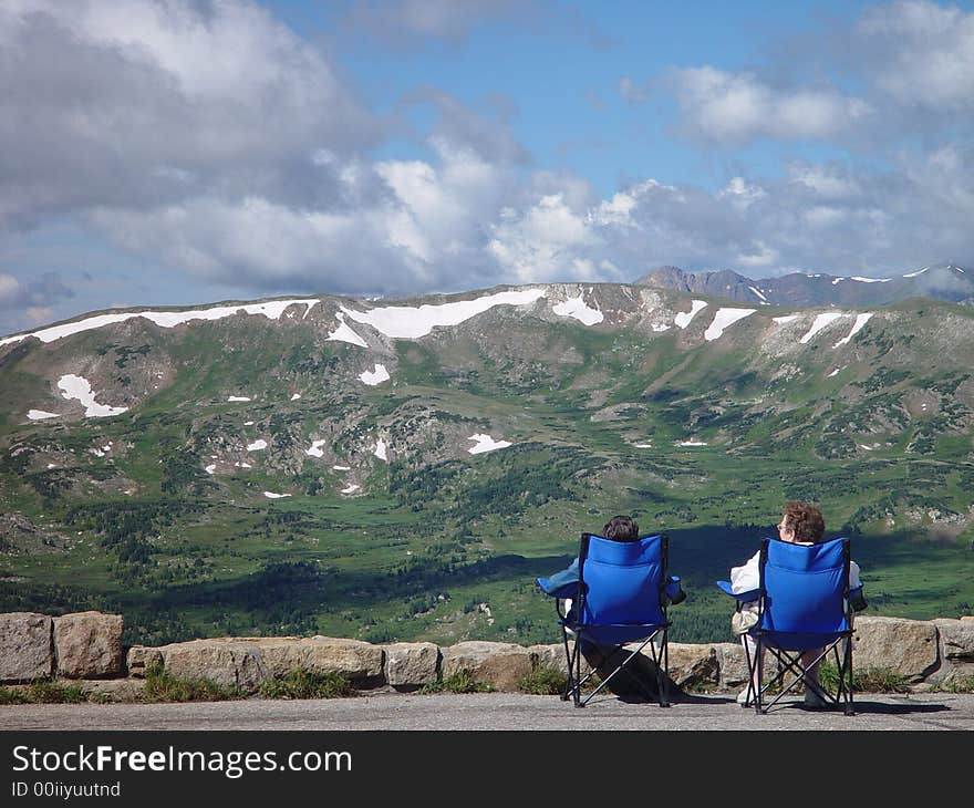 These two ladies enjoy the high alpine sun in Rocky Mountain National Park. These two ladies enjoy the high alpine sun in Rocky Mountain National Park.