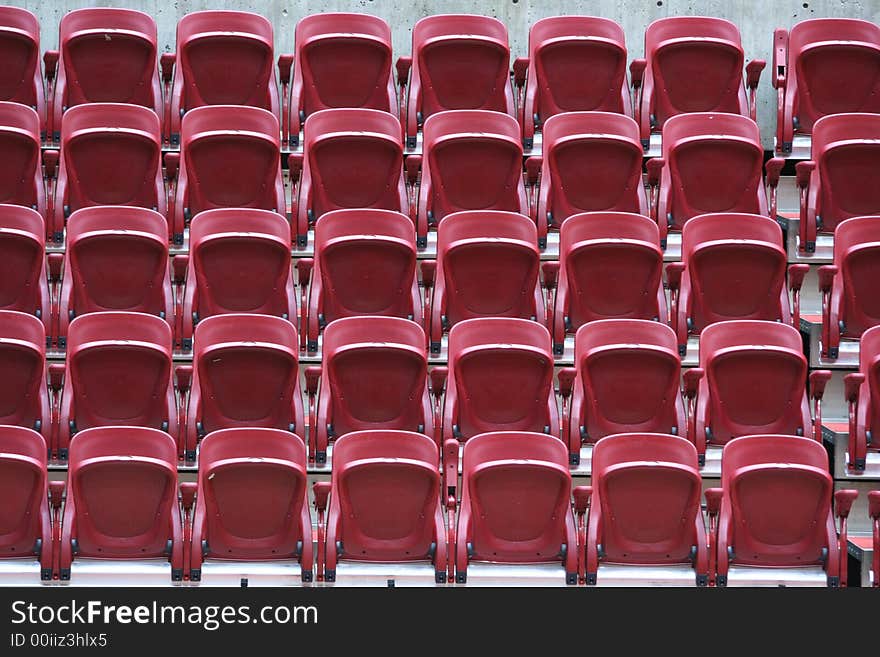 Picture of empty seats in a basketball arena. Picture of empty seats in a basketball arena.