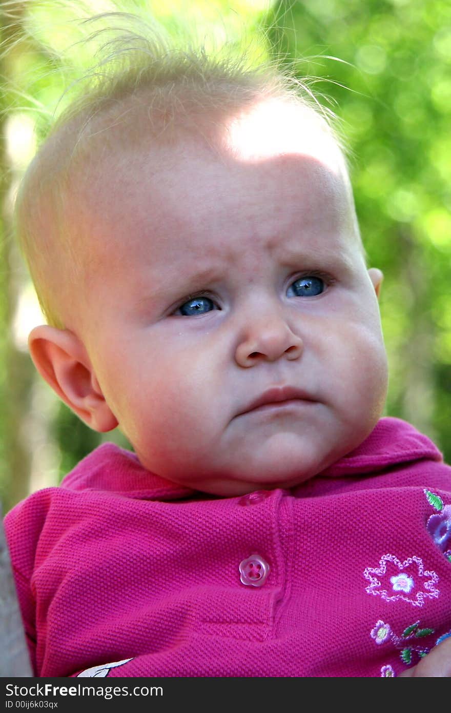 Little Baby Girl closeup on trees in summer. Little Baby Girl closeup on trees in summer