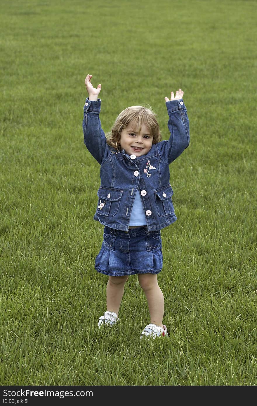 Cute little girl looking at the camera. Cute little girl looking at the camera