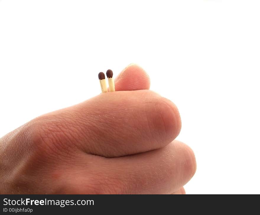 Two matches in the hand on white background. Two matches in the hand on white background