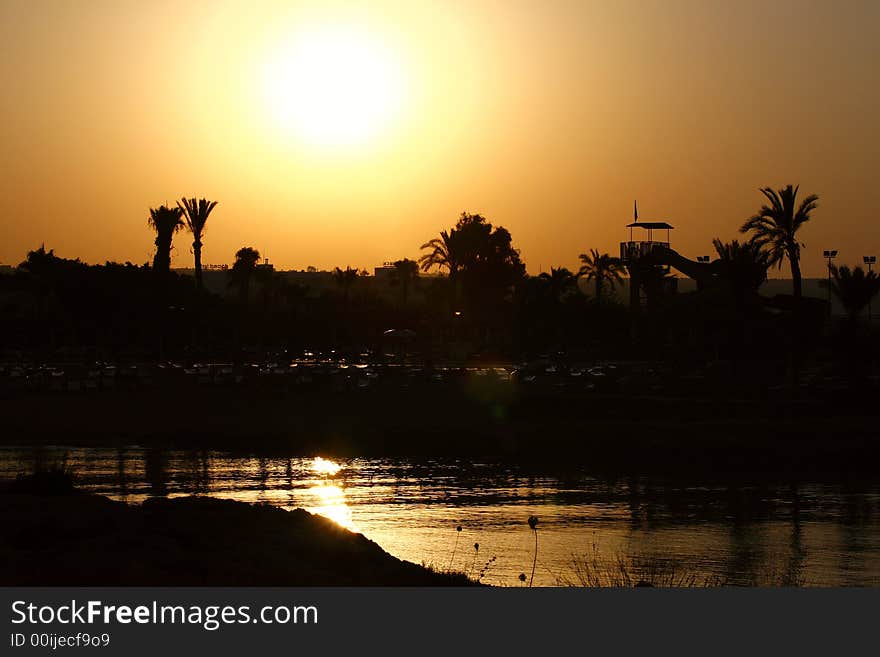 A photo of colourful sunrise\sunset on the beach. A photo of colourful sunrise\sunset on the beach