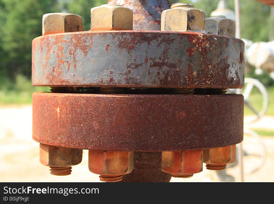 Rusty industrial fittings in crystal clear detail.