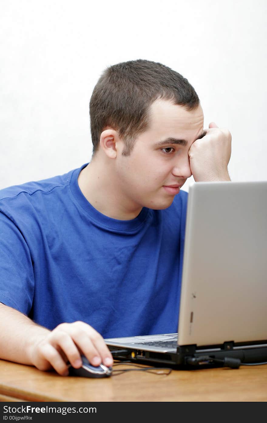 Student working on his laptop