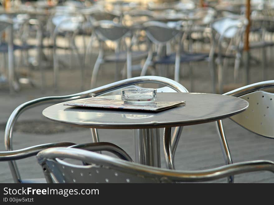 Empty desks in a bistro, outdoor, monochrome