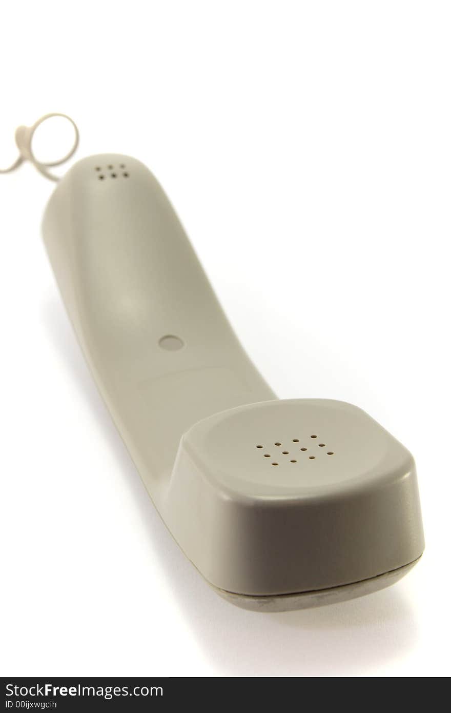 A modern phone handset, isolated on a white background. A modern phone handset, isolated on a white background.