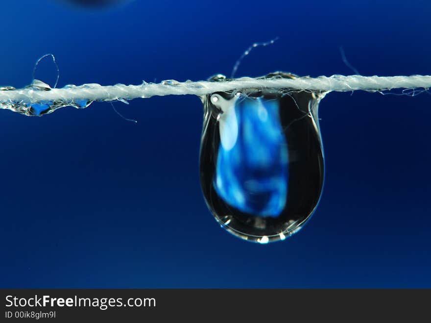 Thread, water droplets