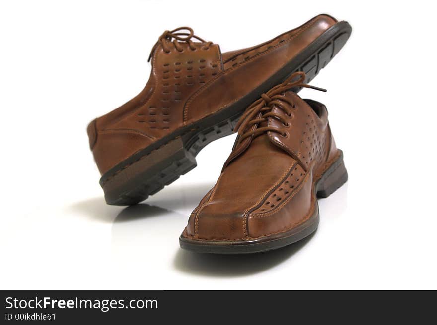 Pair of brown shoes isolated o