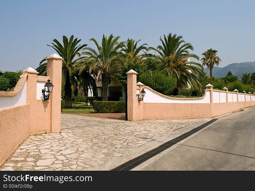 Exotic propriety with green palm trees in Corfu Island - Greece