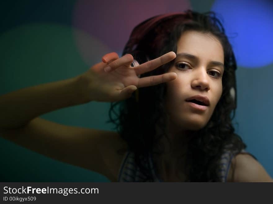 Young beautiful girl listening music