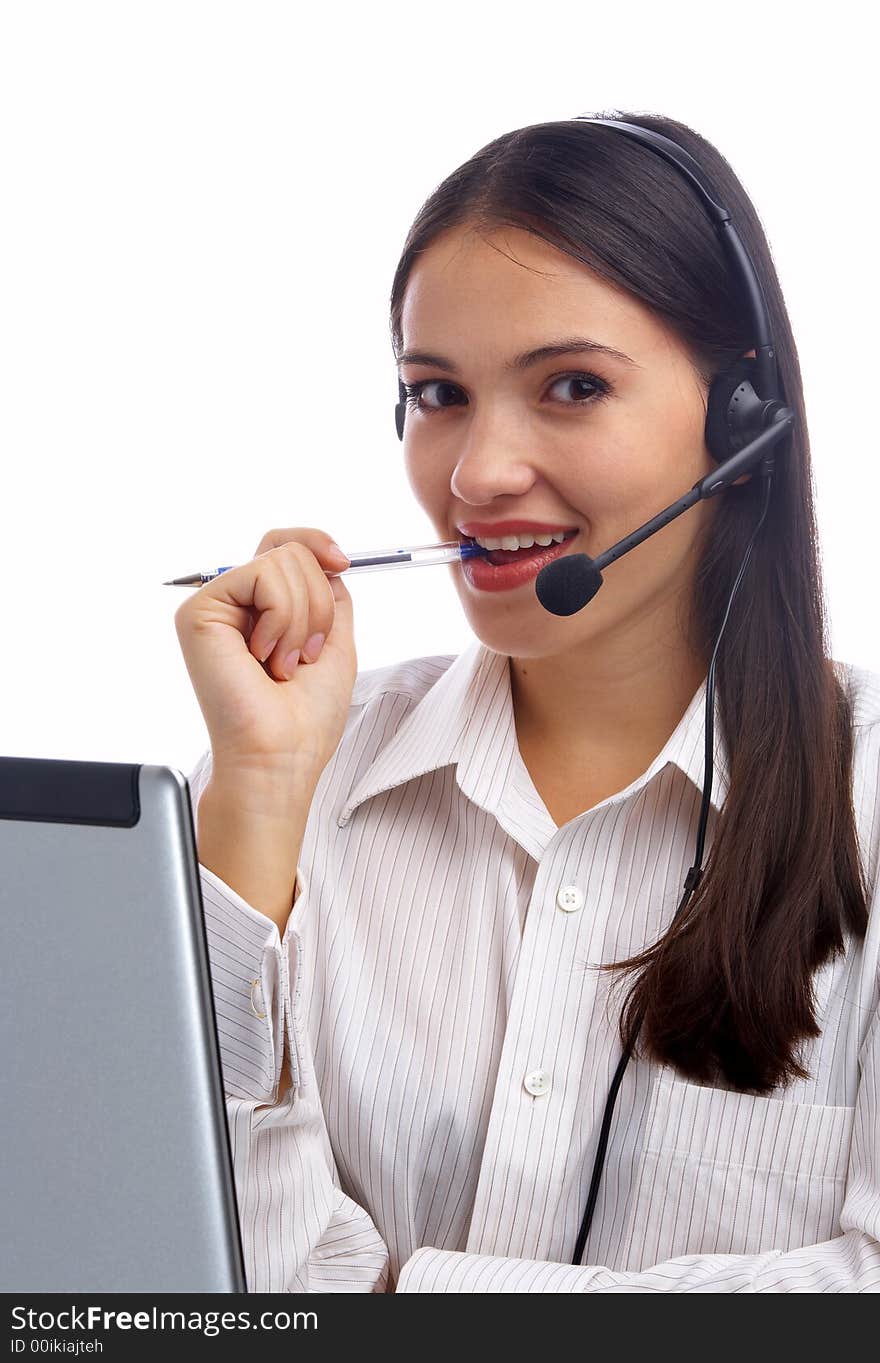 View of nice young woman operator at her working place. View of nice young woman operator at her working place