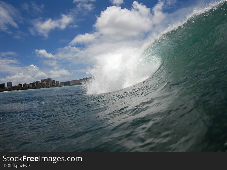 A beautiful barreling wave in Honolulu, Hawaii. A beautiful barreling wave in Honolulu, Hawaii