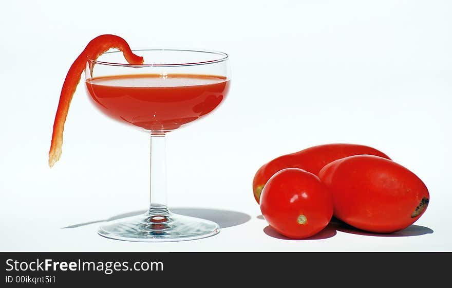 Tomato Cocktail and tomatoes. Isolated. Bright colorful warm naturel light. Tomato Cocktail and tomatoes. Isolated. Bright colorful warm naturel light.