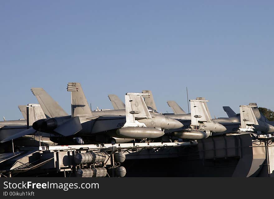 American Fighter Jets On The Flight Deck Of An Aircraft Carrier