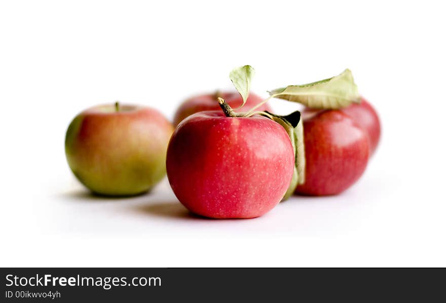 Red apples on white background