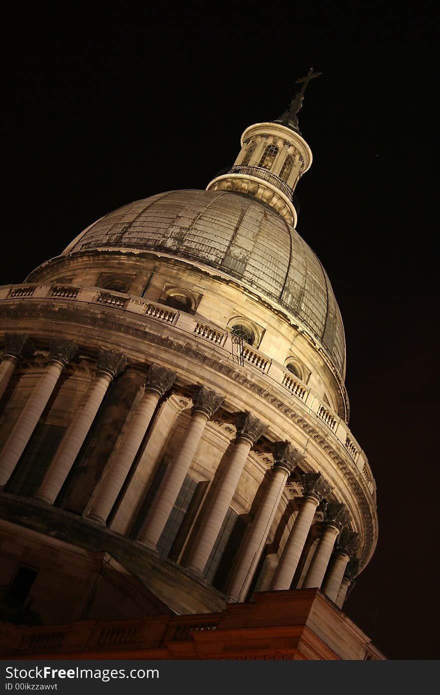 Night photograph of the neoclassical dome of the Pantheon monument in Paris, France. Night photograph of the neoclassical dome of the Pantheon monument in Paris, France.