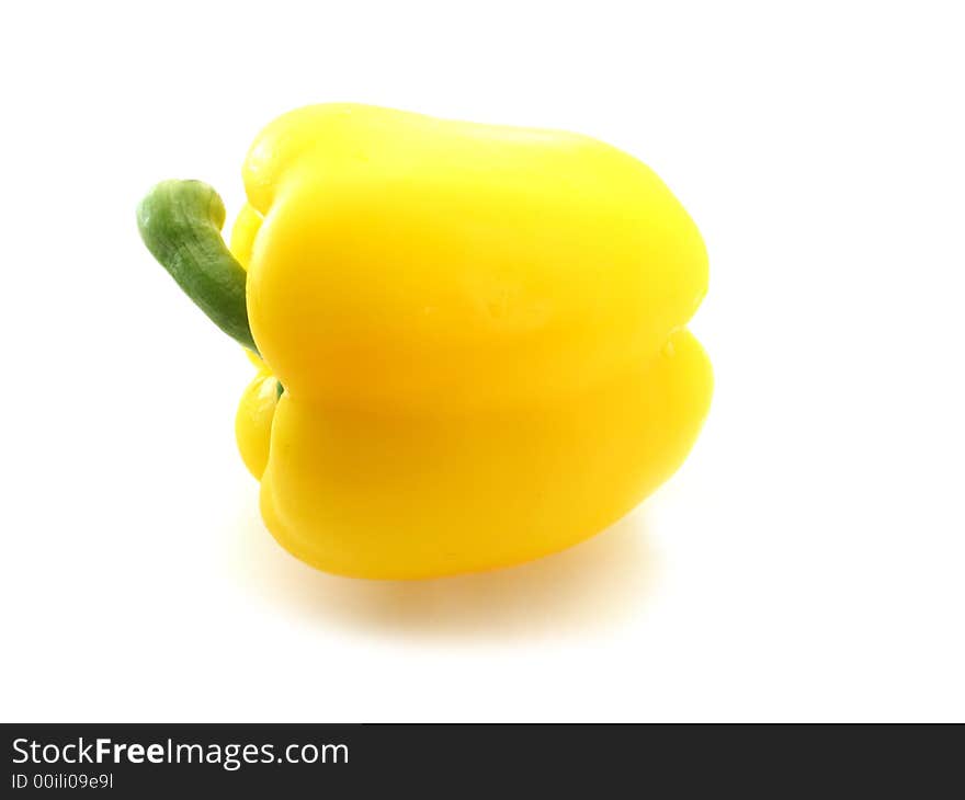 Yellow sweet ripe pepper on white background. Yellow sweet ripe pepper on white background