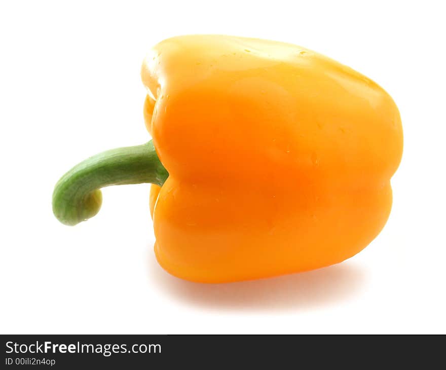 Orange sweet ripe pepper on white background. Orange sweet ripe pepper on white background