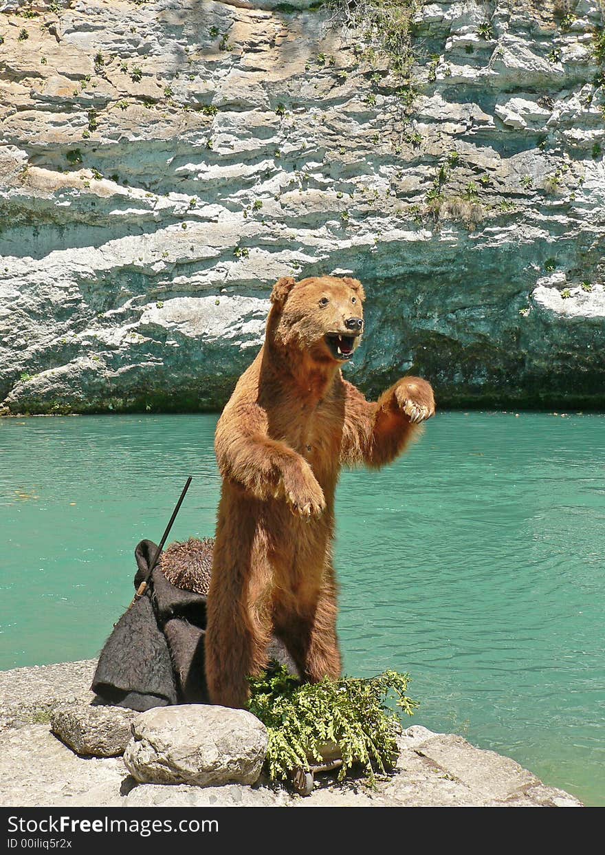 Scarecrow of a bear on lake blue. Scarecrow of a bear on lake blue.