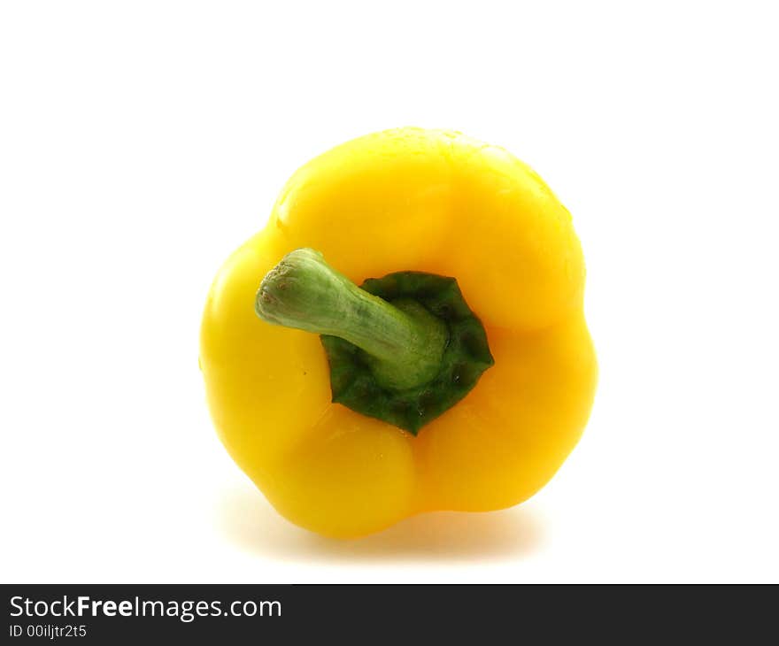 Yellow sweet ripe pepper on white background. Yellow sweet ripe pepper on white background