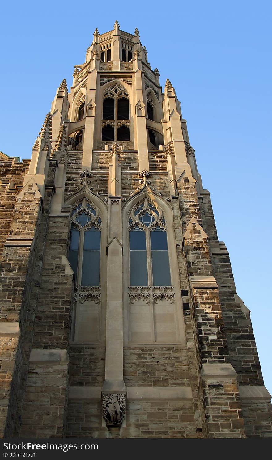 The ornate bell tower of a church. The ornate bell tower of a church.