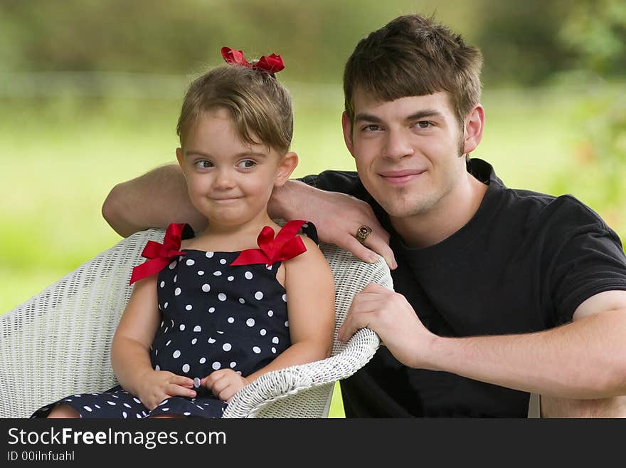 Little Girl glancing to see if young man is still beside her.