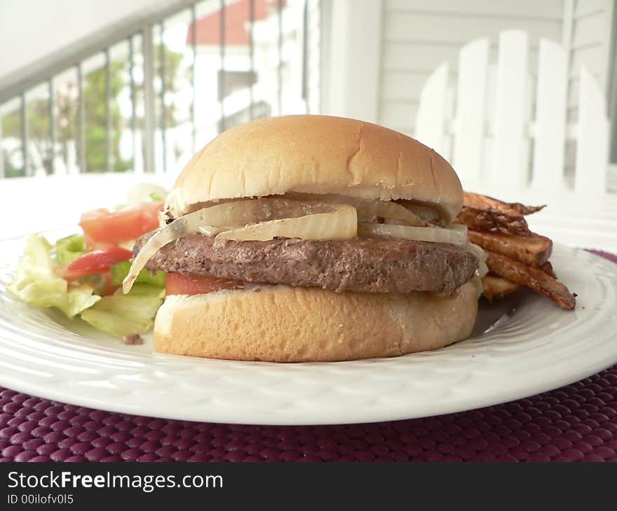 Burger with salad and fries