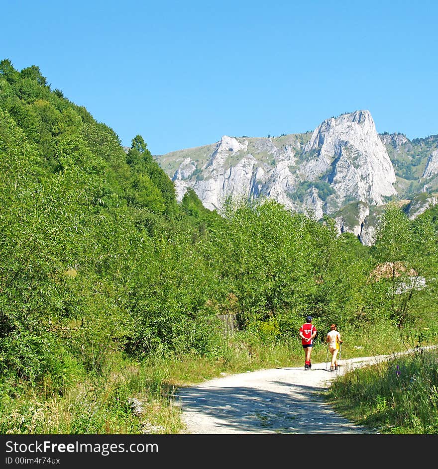 Tourists walking in mountains