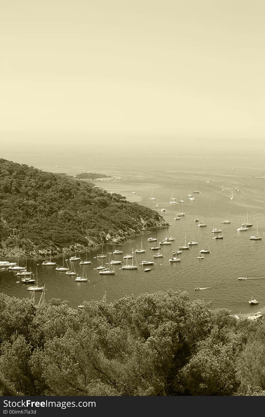 Beautiful clear water and yachts off island of port cros, france