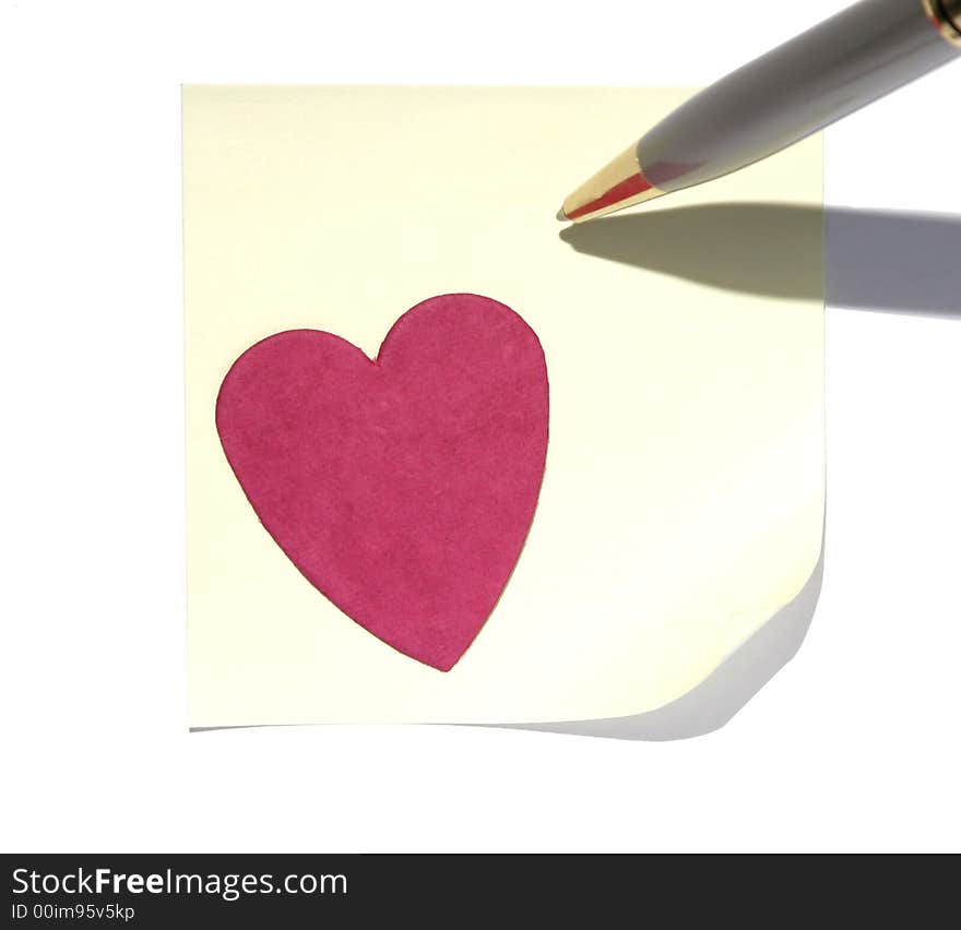 Yellow Blank Post-It Note With A Red Heart And Pen, Space For Own Text, Background. Yellow Blank Post-It Note With A Red Heart And Pen, Space For Own Text, Background