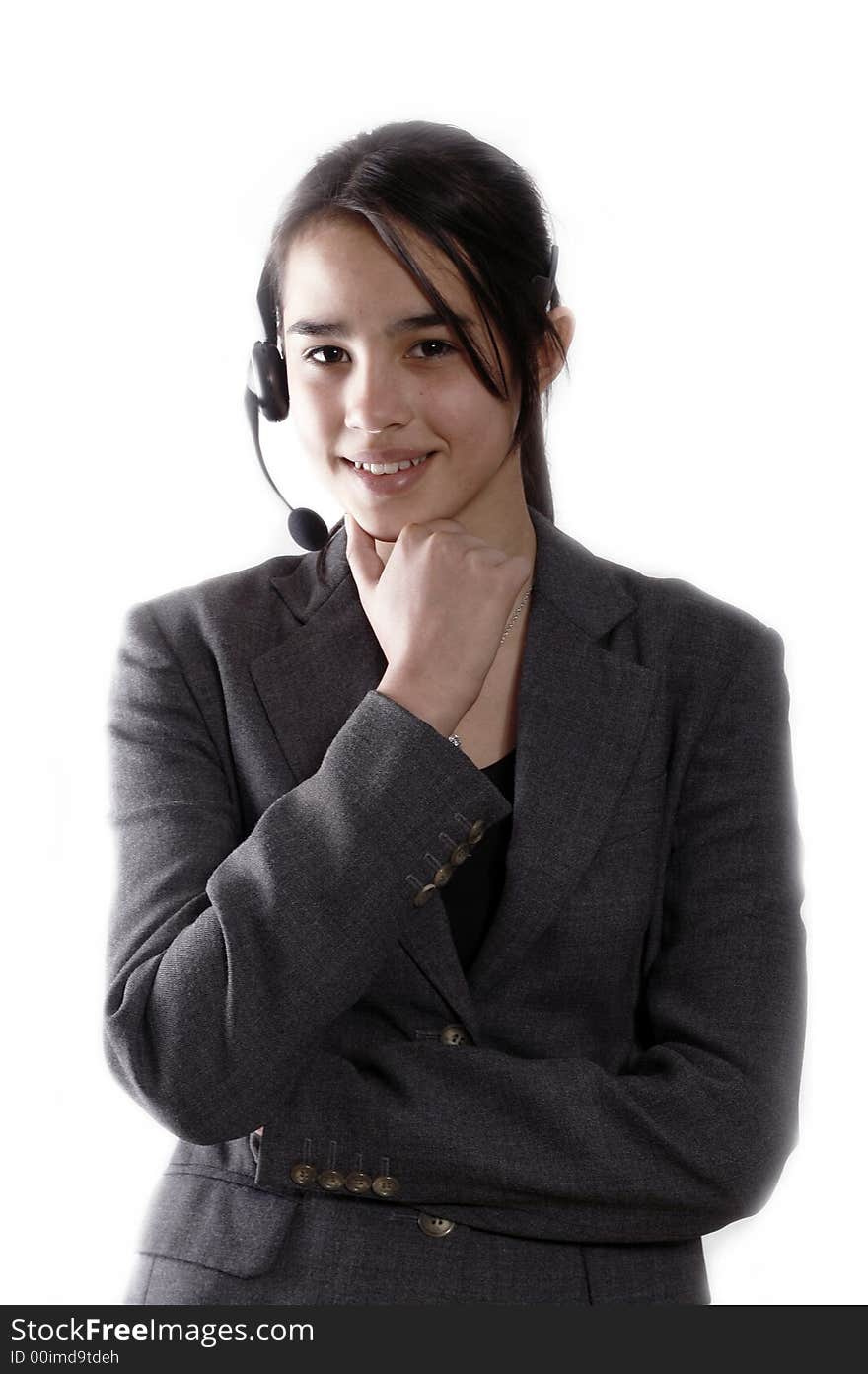 A friendly secretary/telephone operator at a call-center. A friendly secretary/telephone operator at a call-center